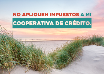 Una playa con la frase: "No apliquen impuestos a mi cooperativa de crédito".